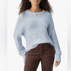 Sanctuary Snow Bunny Sky Blue crewneck sweater. NWOT, never worn. Size small